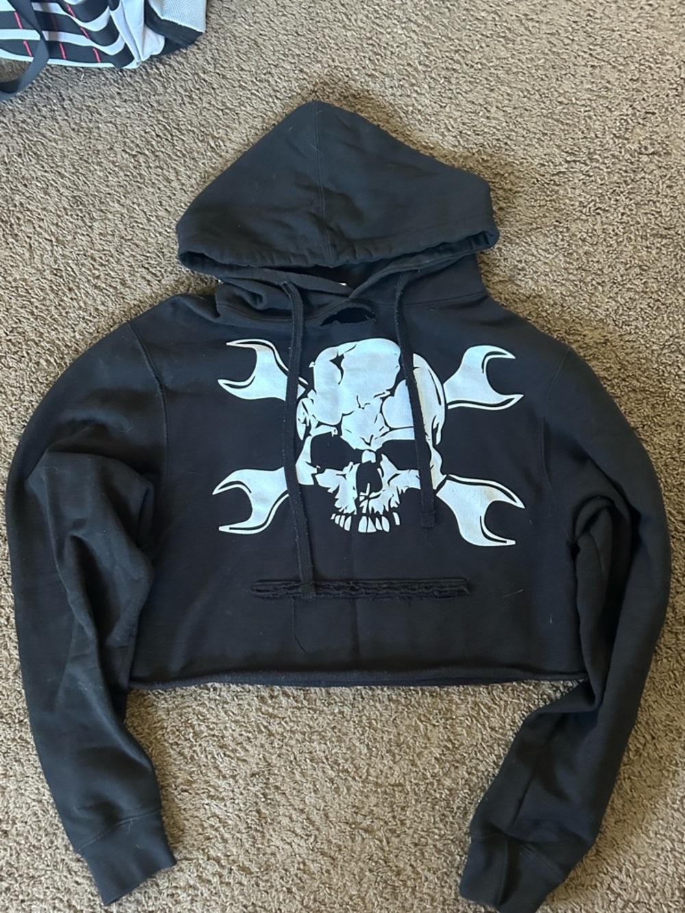 Black Cropped Skull Hoodie with Wrench Graphic